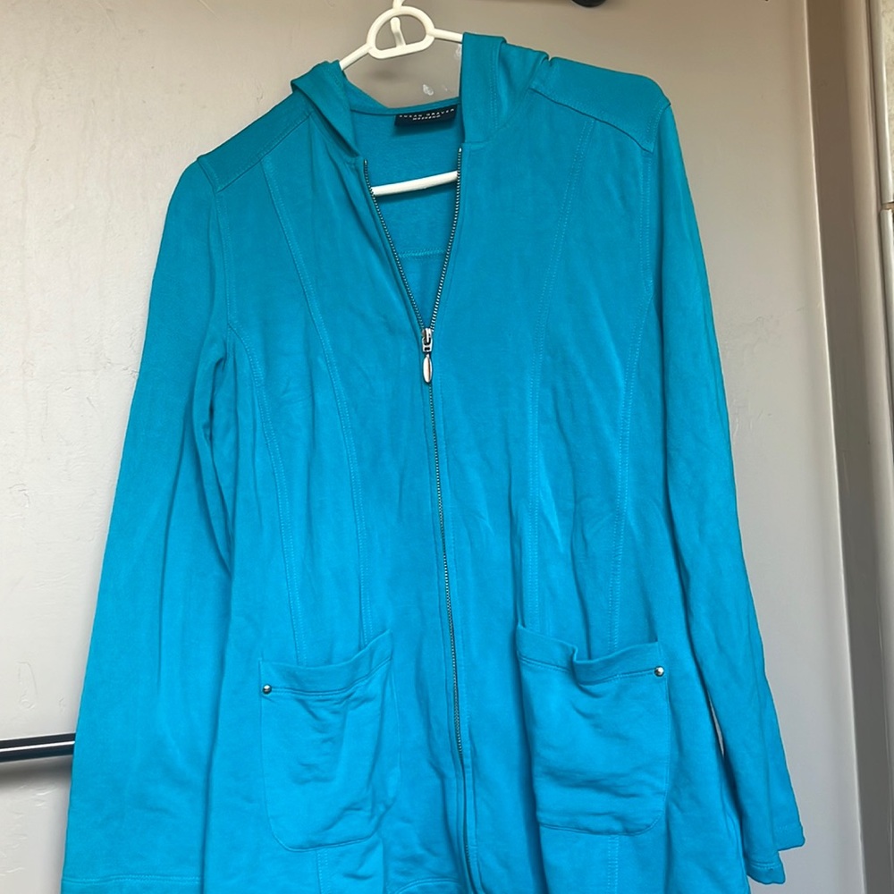 Zip up hoodie.